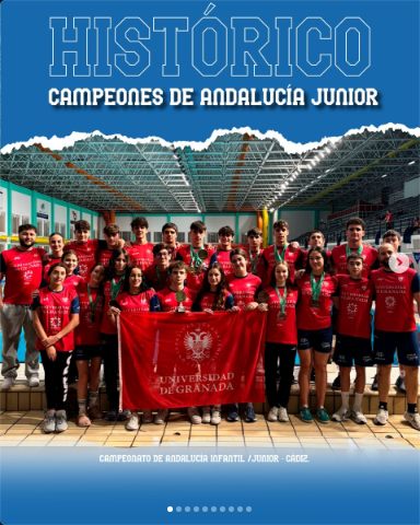 University of Granada swimming team with the club flag in Cádiz